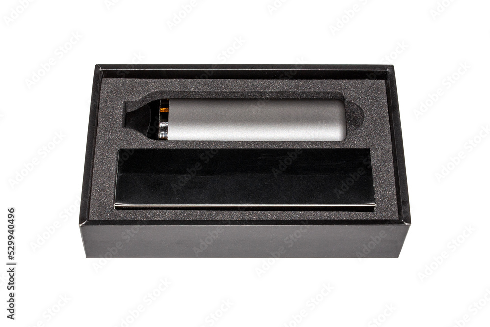 Electronic cigarette in a box on a white background.Reusable electronic cigarette. Vaporizer with nicotine solution.Vape with liquid for smoking. Electronic cigarette in a box on a white background.Reusable electronic cigarette. Vaporizer with nicotine solution.Vape with liquid for smoking.