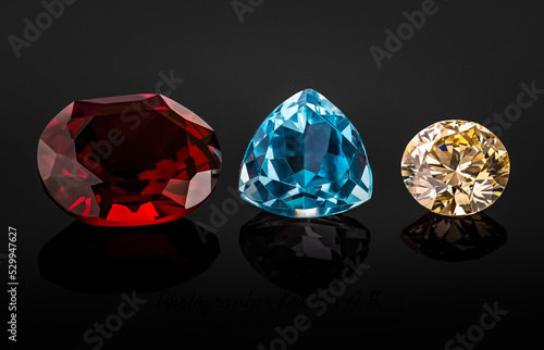 colored diamonds and diamonds on a black background
