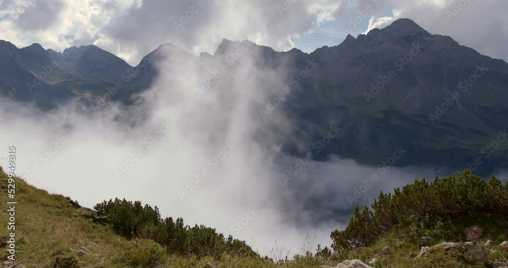 time lapse of fog moving through the mountains in a valley and on the end it is compleatly foggy time lapse of fog moving through the mountains in a valley and on the end it is compleatly foggy