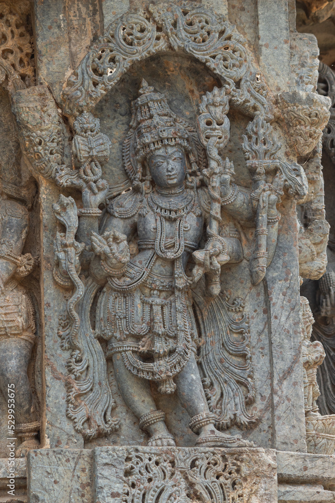 Carving Sculpture of Lord Shiva on the Hoysaleshwara Temple, Halebeedu, Hassan, Karnataka, India.