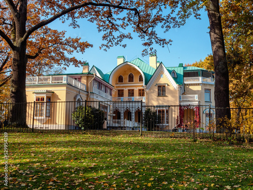 Peterhof, Alexandria Park in autumn. The Cottage Palace in the Neo-Gothic style. photo