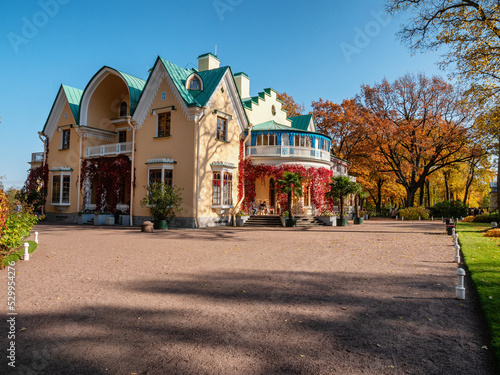 Peterhof, Alexandria Park in autumn. The Cottage Palace in the Neo-Gothic style.
