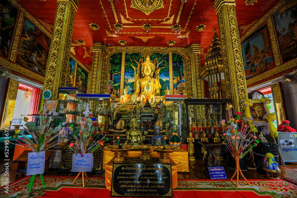 Wat Phra That Haripunchai Woramahawihan-Lamphun: 20 August 2022, the atmosphere inside the temple, tourists come to make merit in the area, Mueang Lamphun District, Thailand