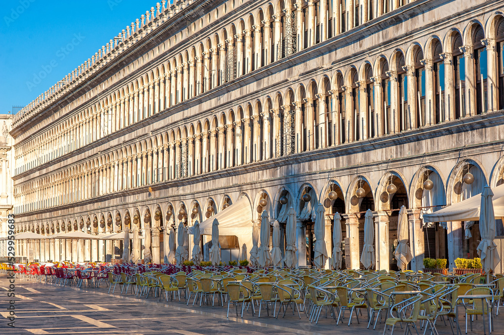 View of Street cafe on the square San Marco Piazza in Venice in the morning.