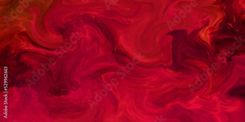 Fire flames on a red background with Luxurious colorful liquid marble surfaces design. Abstract color acrylic pours liquid marble surface design. Beautiful fluid abstract paint background.
