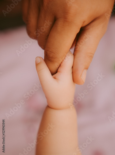 Wallpaper Mural 3 month old baby holding hands  Torontodigital.ca