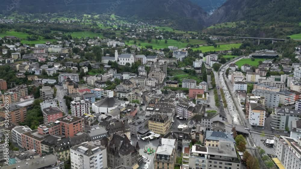 An aerial view of the city of Brig in Switzerland. In the scene you can see the church of Brig and Stockalper Castle An aerial view of the city of Brig in Switzerland. In the scene you can see the church of Brig and Stockalper Castle