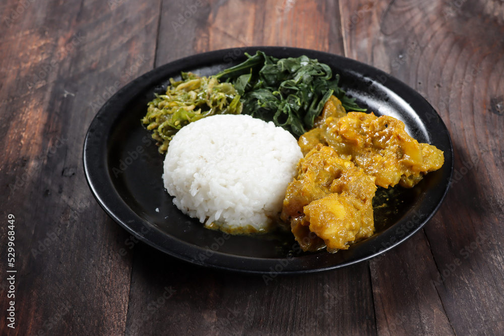 Nasi Padang with Gulai Kikil and various side dish. Nasi Padang with Gulai Kikil and various side dish.