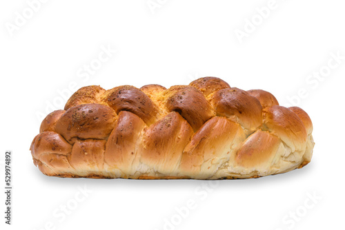 Close-up of a traditional sweet braided yeast bread called - zopf, challah, petticoat or brioche isolated on a transparent background.