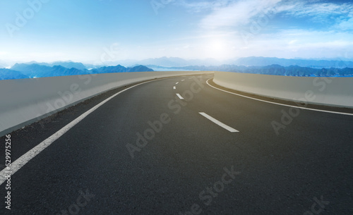 Empty road and city buildings background