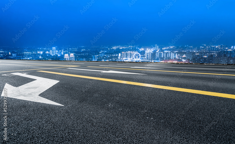 Fototapeta premium Empty road and city buildings background