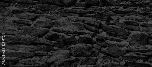 Ancient black stone wall grunge texture