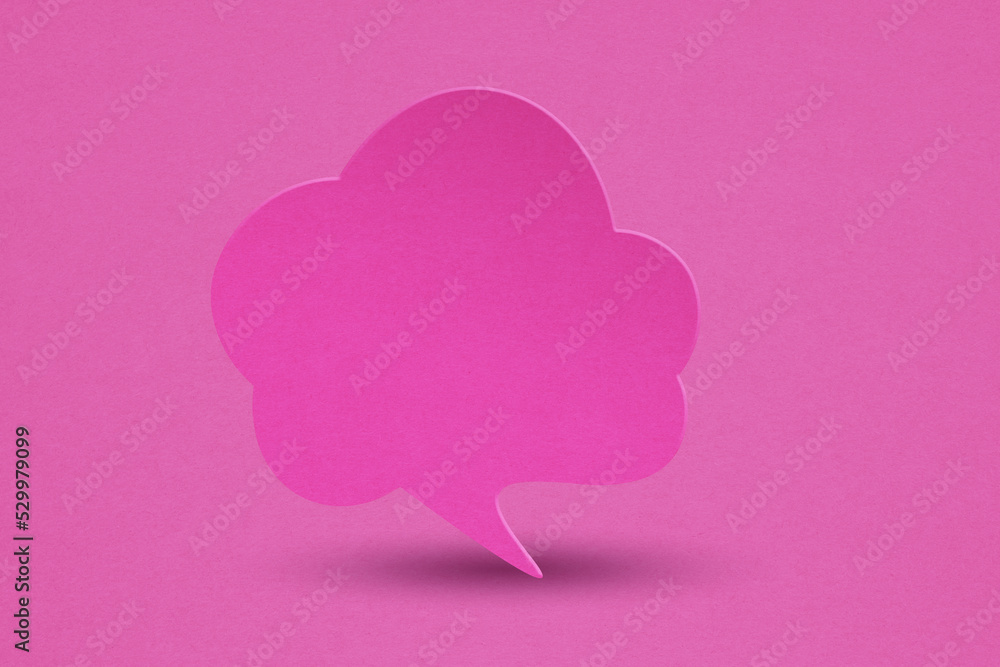 blank pink speech bubble grunge  paper cut, on grunge yellow paper background. Conceptual image about communication and social media