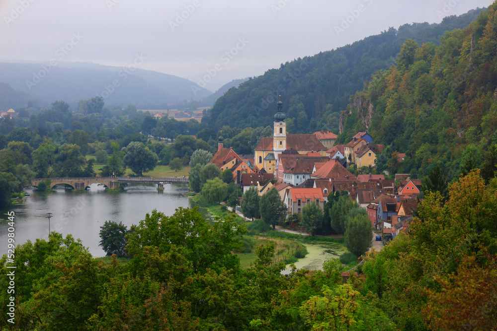 Germany, Bavaria, Kallmunz, View of small town situated on bank of river Naab in early autumn Germany, Bavaria, Kallmunz, View of small town situated on bank of river Naab in early autumn