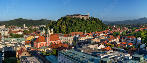 Slovenia, Ljubljana, Panoramic view of Ljubljana Castle overlooking old town below photo