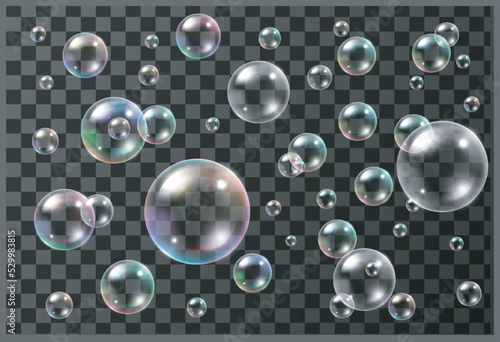 Set of realistic colorful soap bubbles on transparent background