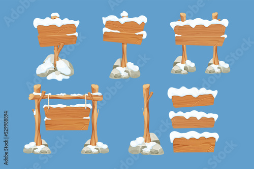 Set winter old wooden blank, signboard with snow in cartoon style.Empty frames, direction plank isolated on blue background. Season decoration