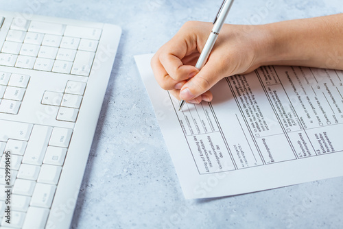 Photos Insolvency - filling official German document to apply to court about an insolve