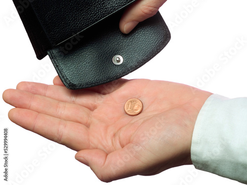 Photography Financial distress, hand holds the last penny from the wallet