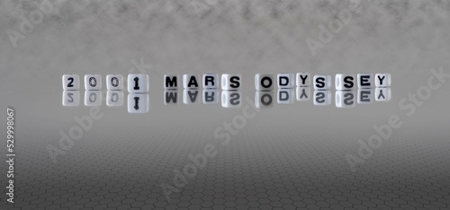 2001 mars odyssey word or concept represented by black and white letter cubes on a grey horizon background stretching to infinity