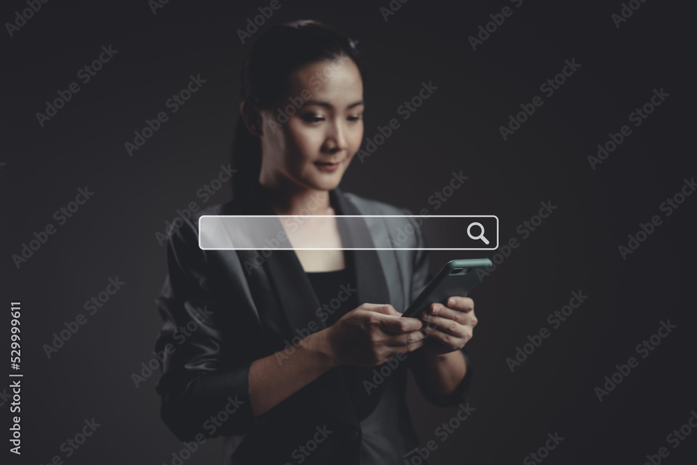 Asian woman using smart phone for searching with browser icon hologram effect. Asian woman using smart phone for searching with browser icon hologram effect.