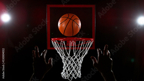 Detail of basketball player scoring. © Jag_cz