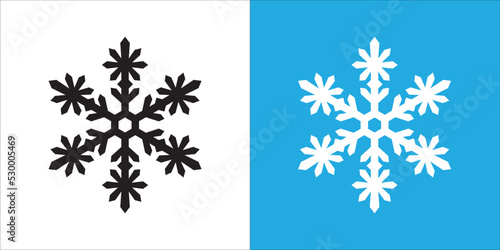 Single snowflake vector design. Snow flake icon. Distinctive hexagonal shape in white, black, and blue color for paper cut craft and illustration.