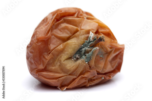 Φωτογραφία Rotten apple close-up isolated on white background