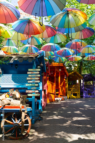 Istanbul street with huts and colorful decorative umbrellas