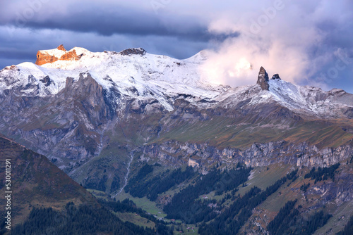 Panoramic view of Swiss Alps mountain peaks, Jungfrau, sunset, Bernese Oberland, Switzerland photo