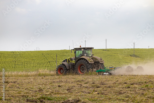 Ryazan  Russia - August 30  2022  tractor plows the ground
