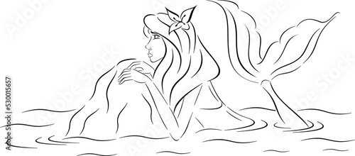 mermaid looks out of the water