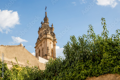 Closeup of the bell tower of the Duomo di San Giorgio, the mother church of the city of Modica in Sicily, Italy.