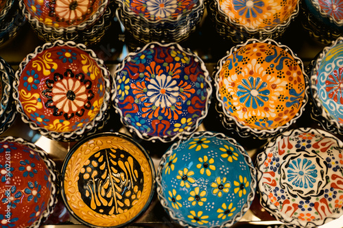 Beautiful plates and bowls on a tourist market in dubai.