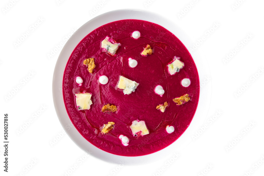 Fragrant first course from beets, cream and blue cheese. Vegetarian dietary cream soup based on baked and fresh vegetables with herbs. Fitness menu. Delivery of prepared food. White background Fragrant first course from beets, cream and blue cheese. Vegetarian dietary cream soup based on baked and fresh vegetables with herbs. Fitness menu. Delivery of prepared food. White background