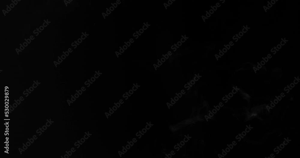 Smoke or steam moves on a black background. Smoke or steam moves on a black background.
