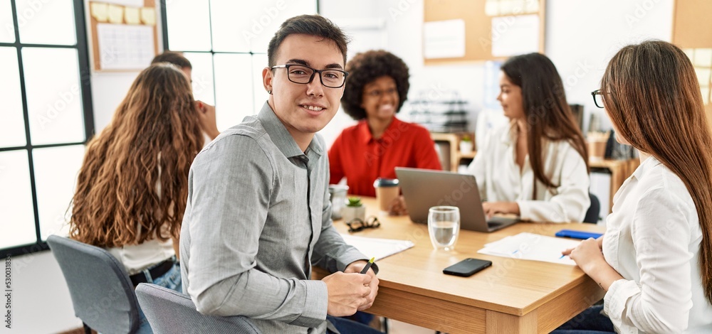 Group of business workers smiling happy working at the office. Group of business workers smiling happy working at the office.