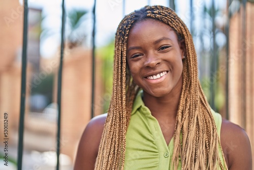 African american woman smiling confident standing at street