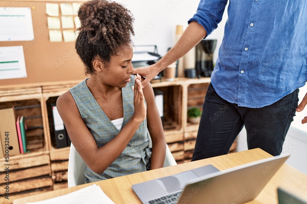 Fototapeta premium Man and woman business workers on sexual harassment concept at office