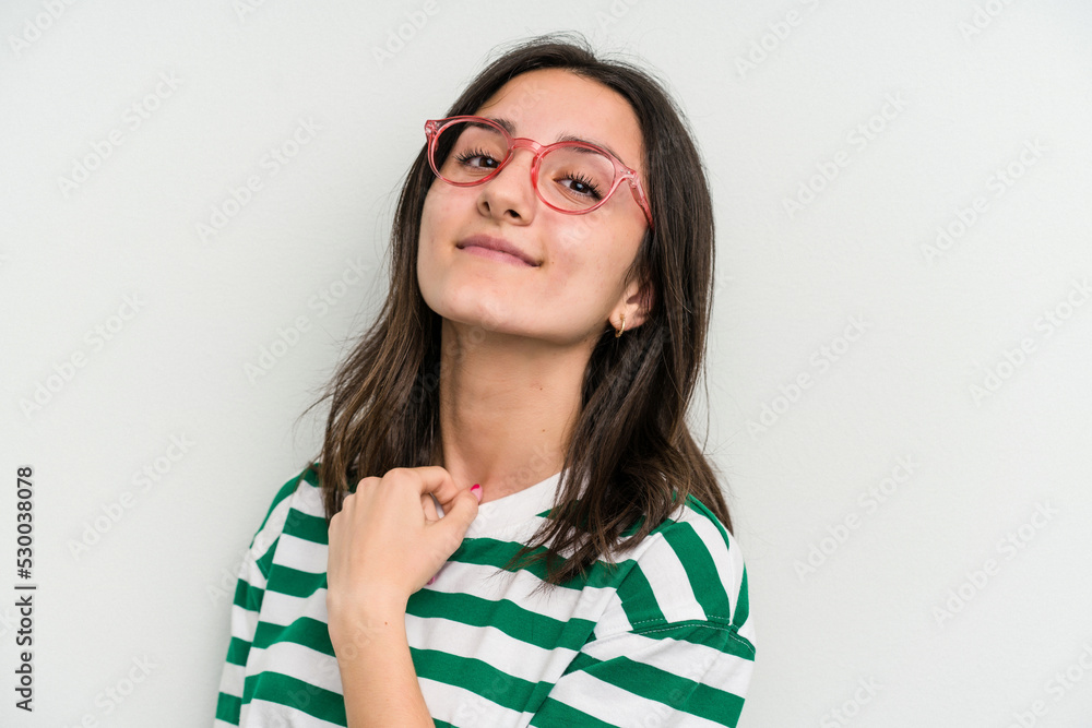 Fototapeta premium Young caucasian woman wearing a glasses isolated on blue background