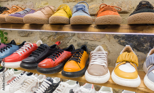Photo of colorful shoes in shop, Variety of the colorful shoes in store