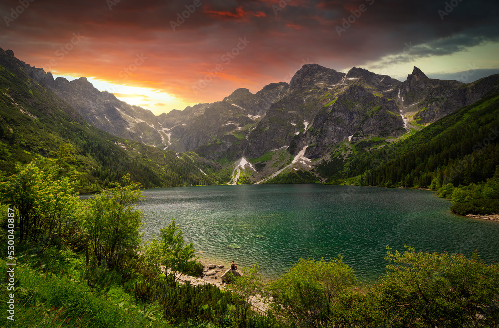 Amazing sunset in the Tatra Mountains above Eye of the Sea Lake, Poland - obrazy, fototapety, plakaty 