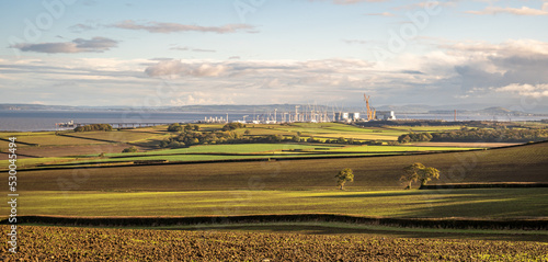 Early morning looking across the fields of Somerset towards the Bristol Channel and Hinkley Point Power Station