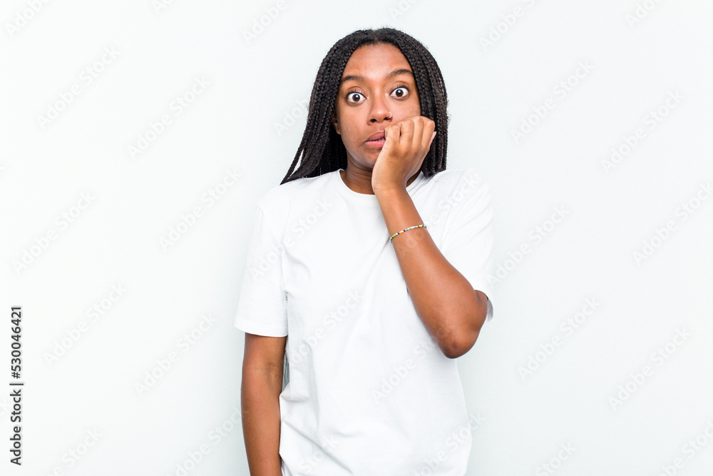 Young African American woman isolated on white background biting fingernails, nervous and very anxious. Young African American woman isolated on white background biting fingernails, nervous and very anxious.