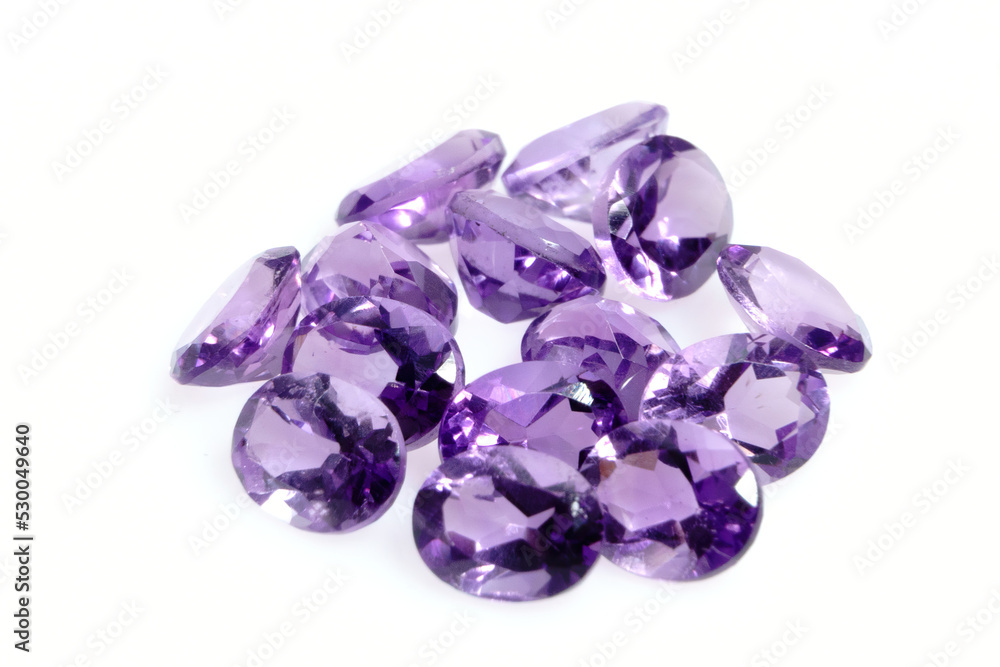 Natural gemstone purple amethyst on white background Natural gemstone purple amethyst on white background