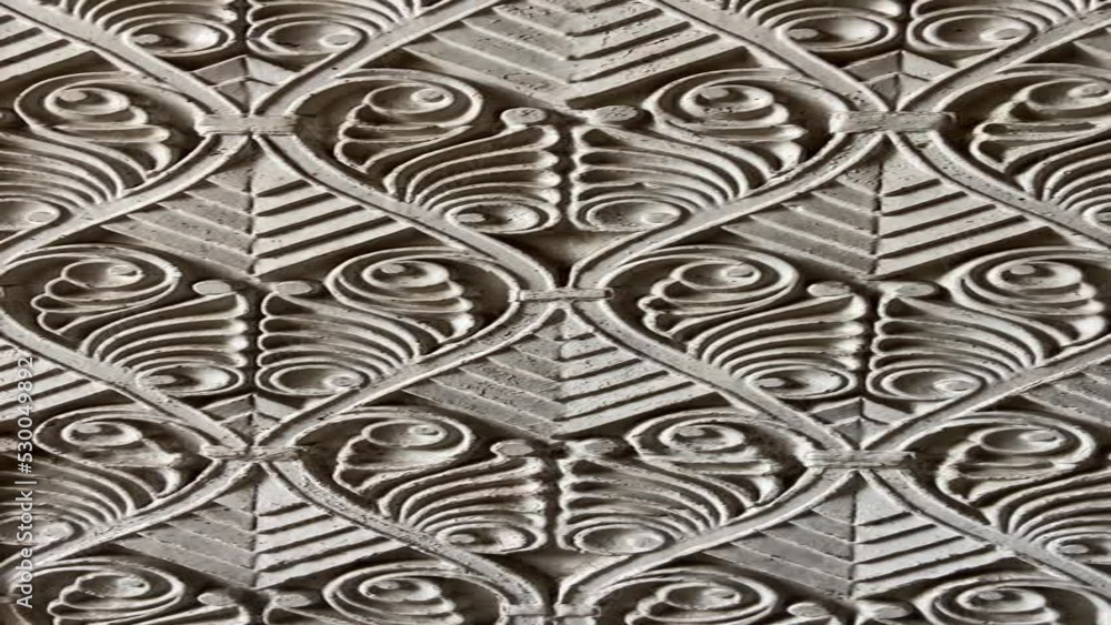 fragment of an ornament on a stone fragment of an ornament on a stone