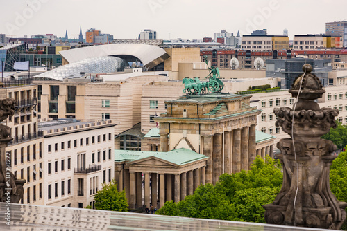 View from Reichstag to Brandenburg Gate and cityscape of Berlin, Germany photo