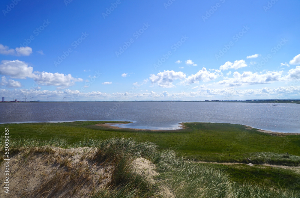 view of an offshore lake between the dunes of the North Sea on Denmark's coast and the Limfjord, nature, vastness view of an offshore lake between the dunes of the North Sea on Denmark's coast and the Limfjord, nature, vastness