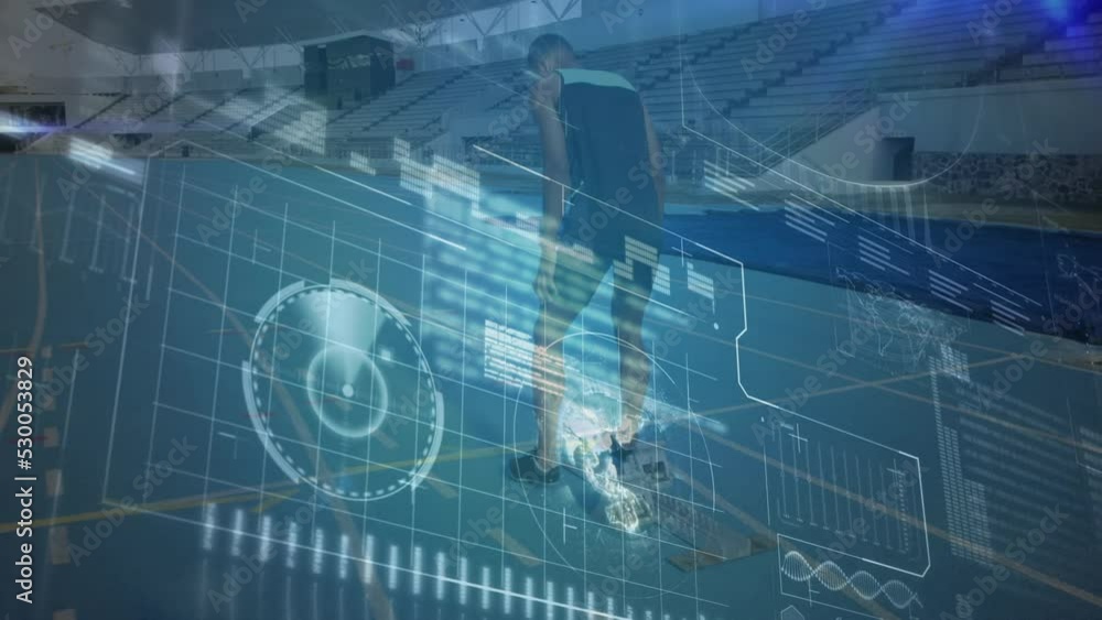 Animation of interface with data processing over male athlete in starting position on sports field Animation of interface with data processing over male athlete in starting position on sports field