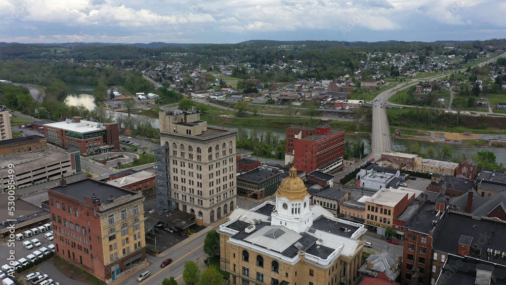 The Marion County courthouse in Fairmont, WV, and the surrounding small town river and countryside in the appalachian mountains. The Marion County courthouse in Fairmont, WV, and the surrounding small town river and countryside in the appalachian mountains.
